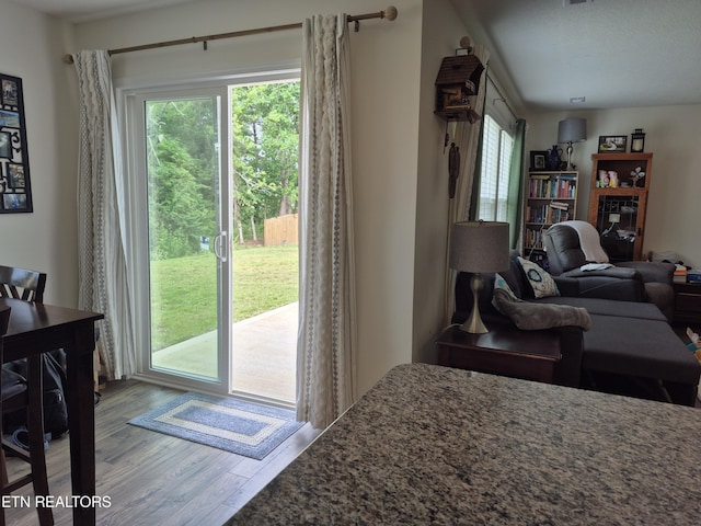 7515 Grasshopper Ln, Corryton, TN 37721 - living room featuring wood finished floors and plenty of natural light