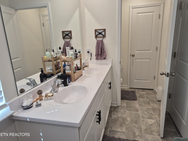 7515 Grasshopper Ln, Corryton, TN 37721 - bathroom with double vanity and stone finish flooring
