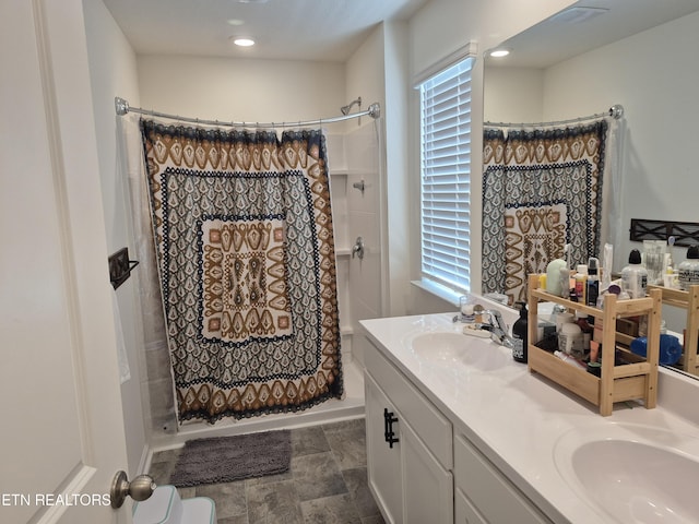 7515 Grasshopper Ln, Corryton, TN 37721 - bathroom with a shower with curtain, double vanity, stone finish flooring, and recessed lighting
