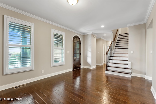 9208 Palomino Way, Knoxville, TN 37922 - foyer entrance featuring plenty of natural light, arched walkways, ornamental molding, hardwood / wood-style flooring, and recessed lighting