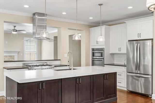 9208 Palomino Way, Knoxville, TN 37922 - kitchen featuring appliances with stainless steel finishes, dark wood-type flooring, backsplash, ceiling fan, and extractor fan