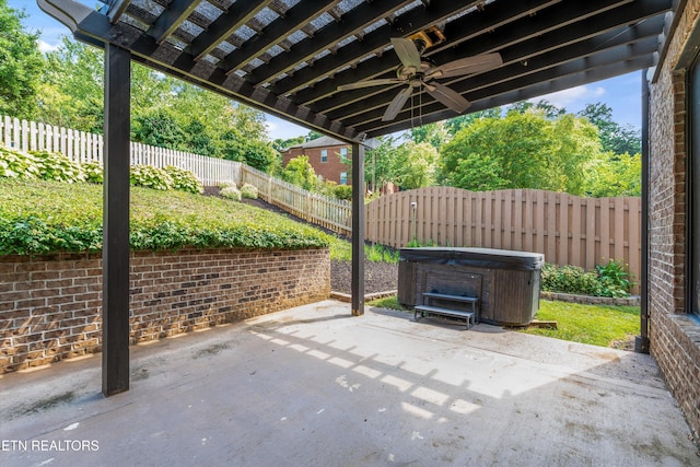 9208 Palomino Way, Knoxville, TN 37922 - fenced backyard featuring a hot tub, a patio area, and ceiling fan
