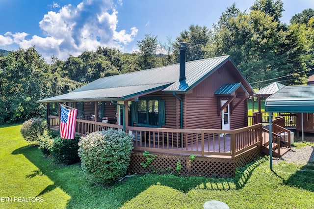 509 Thomas Loop Rd, Sevierville, TN 37876 - back of property with a yard, a metal roof, a wooden deck, and log exterior