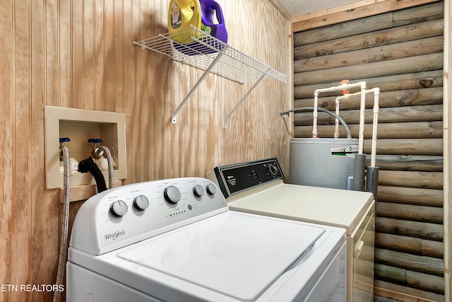 509 Thomas Loop Rd, Sevierville, TN 37876 - washroom featuring log walls, independent washer and dryer, and water heater
