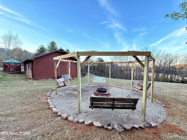 509 Thomas Loop Rd, Sevierville, TN 37876 - view of patio with an outdoor fire pit
