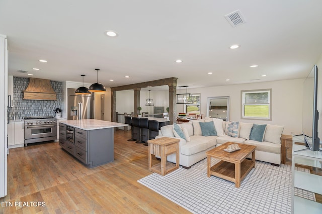 713 Concord Rd, Knoxville, TN 37934 - living room featuring light wood-type flooring and recessed lighting