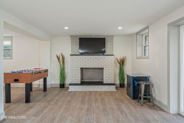 713 Concord Rd, Knoxville, TN 37934 - game room featuring a fireplace, wood finished floors, and recessed lighting