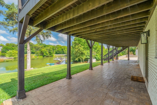 713 Concord Rd, Knoxville, TN 37934 - view of patio / terrace featuring a water view, stairway, and view of wooded area