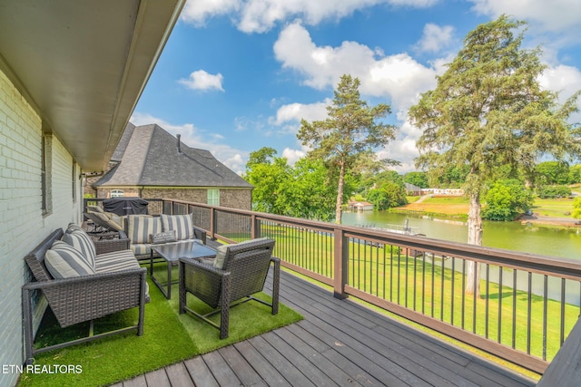 713 Concord Rd, Knoxville, TN 37934 - wooden deck with a water view, outdoor lounge area, and a yard