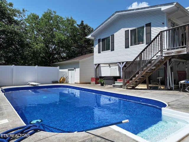 616 Loop Rd, Knoxville, TN 37934 - view of pool with a diving board, stairs, a patio, and a jacuzzi