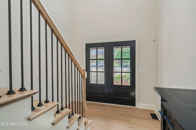 1100 Regality Way, Knoxville, TN 37923 - entrance foyer featuring french doors, light wood finished floors, stairs, and a towering ceiling