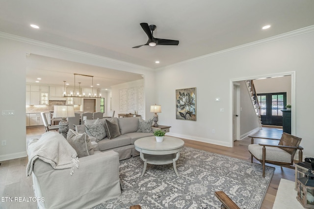 1100 Regality Way, Knoxville, TN 37923 - living area with light wood-type flooring, ornamental molding, recessed lighting, and ceiling fan
