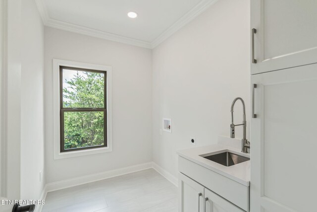 1100 Regality Way, Knoxville, TN 37923 - laundry room with cabinet space, washer hookup, hookup for an electric dryer, ornamental molding, and recessed lighting