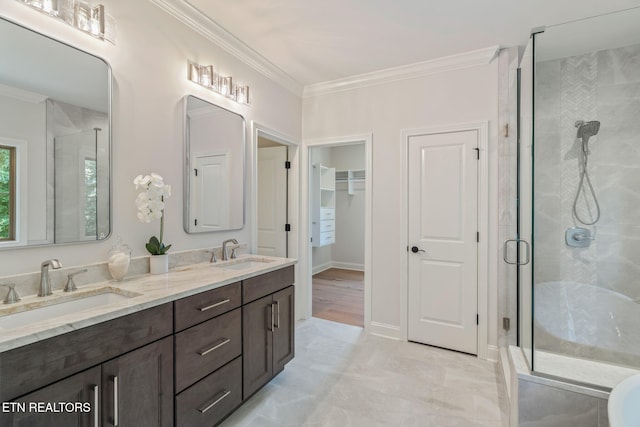 1100 Regality Way, Knoxville, TN 37923 - bathroom featuring crown molding, a shower stall, and double vanity
