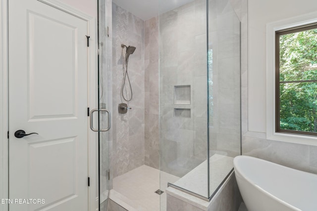 1100 Regality Way, Knoxville, TN 37923 - bathroom with a shower stall and a freestanding bath