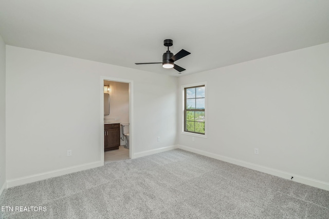 1100 Regality Way, Knoxville, TN 37923 - unfurnished bedroom featuring light carpet, ensuite bath, and a ceiling fan