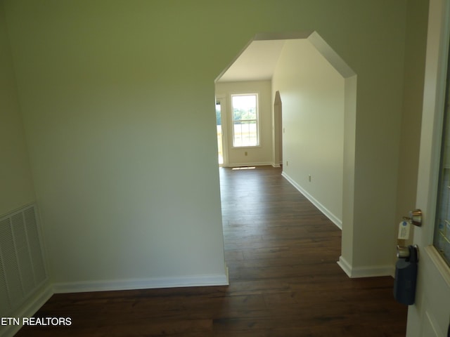 363 Smith Rd, Crossville, TN 38571 - hall with arched walkways and dark wood-style flooring