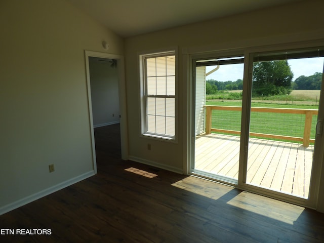 363 Smith Rd, Crossville, TN 38571 - doorway to outside featuring dark wood-type flooring and vaulted ceiling