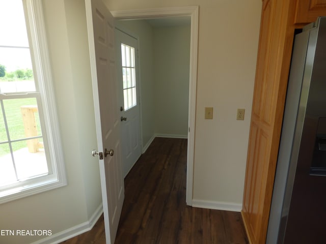 363 Smith Rd, Crossville, TN 38571 - hallway featuring plenty of natural light and dark wood-style flooring