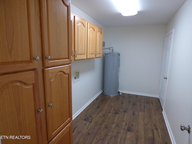 363 Smith Rd, Crossville, TN 38571 - laundry area featuring water heater, cabinet space, washer hookup, and dark wood-type flooring
