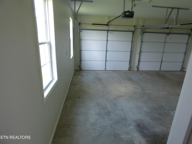 363 Smith Rd, Crossville, TN 38571 - garage with a garage door opener and baseboards