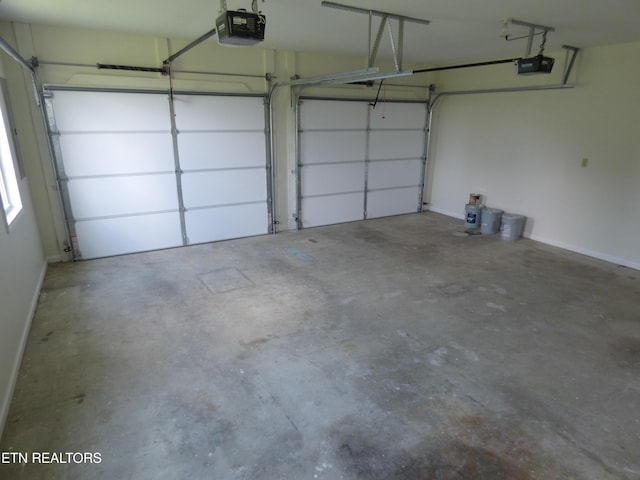 363 Smith Rd, Crossville, TN 38571 - garage featuring a garage door opener