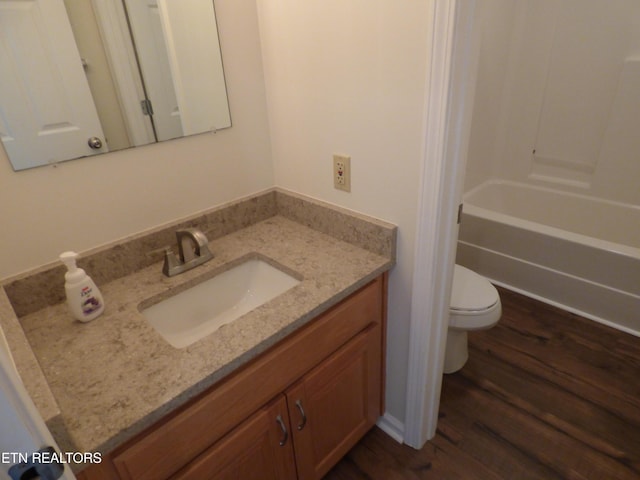 363 Smith Rd, Crossville, TN 38571 - full bathroom featuring vanity, wood finished floors, and shower / washtub combination