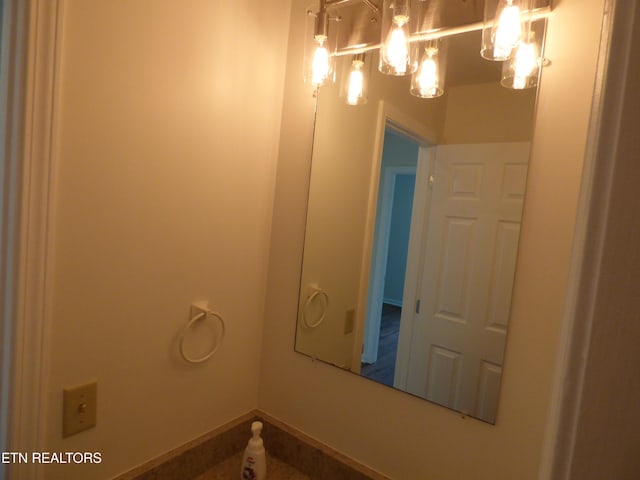 363 Smith Rd, Crossville, TN 38571 - bathroom featuring a chandelier