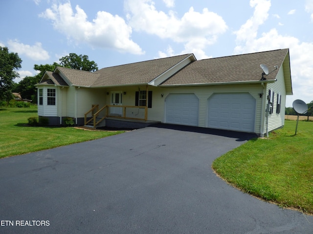 363 Smith Rd, Crossville, TN 38571 - single story home featuring a garage, driveway, a shingled roof, and a front yard