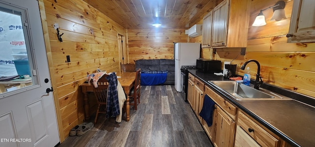 1955 Terry Rd, Oneida, TN 37841 - kitchen featuring dark countertops, dark wood-type flooring, wooden walls, an AC wall unit, and black microwave
