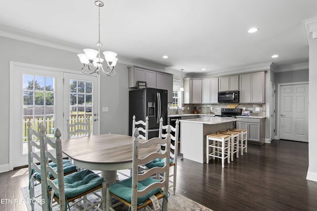 1152 Cloud View Dr, Powell, TN 37849 - dining area with ornamental molding, a chandelier, dark wood-type flooring, and recessed lighting