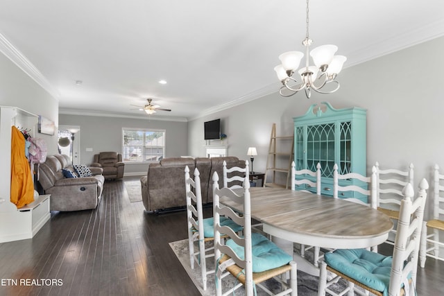 1152 Cloud View Dr, Powell, TN 37849 - dining room with a chandelier, crown molding, ceiling fan, dark wood-style floors, and recessed lighting
