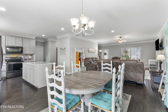 1152 Cloud View Dr, Powell, TN 37849 - dining space with a chandelier, ceiling fan, recessed lighting, dark wood finished floors, and crown molding