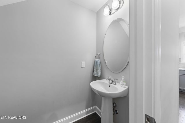 1152 Cloud View Dr, Powell, TN 37849 - bathroom featuring baseboards and wood finished floors