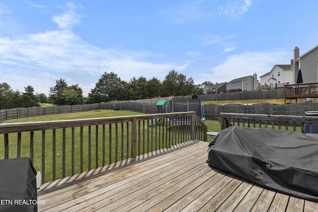 1152 Cloud View Dr, Powell, TN 37849 - wooden deck with a playground, a fenced backyard, a residential view, and a grill