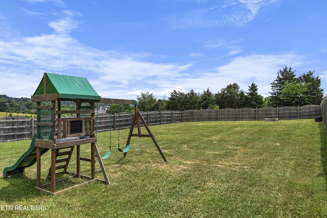 1152 Cloud View Dr, Powell, TN 37849 - fenced backyard with a playground