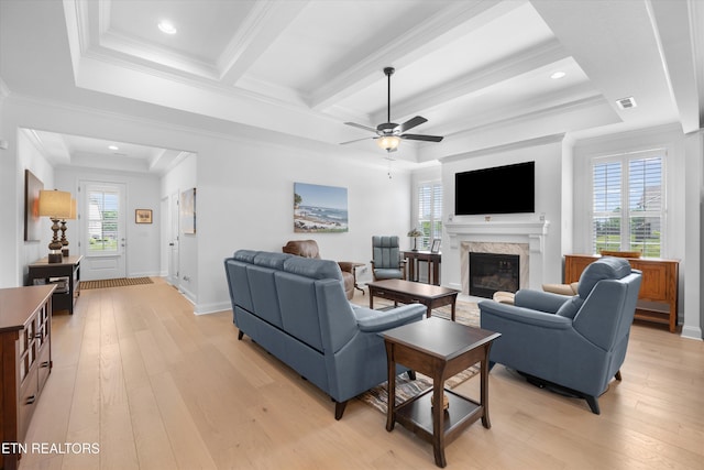 12845 Scarlet Sage Dr, Farragut, TN 37934 - living area featuring light wood-type flooring, ceiling fan, a glass covered fireplace, crown molding, and recessed lighting