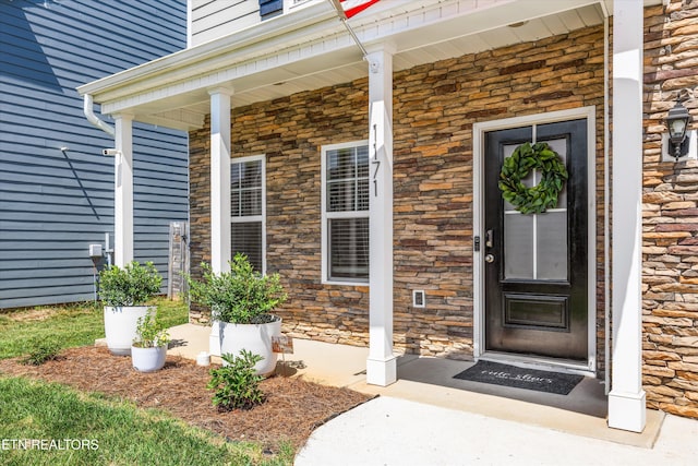 1171 Hampton Place Cir, Loudon, TN 37774 - doorway to property with covered porch and stone siding