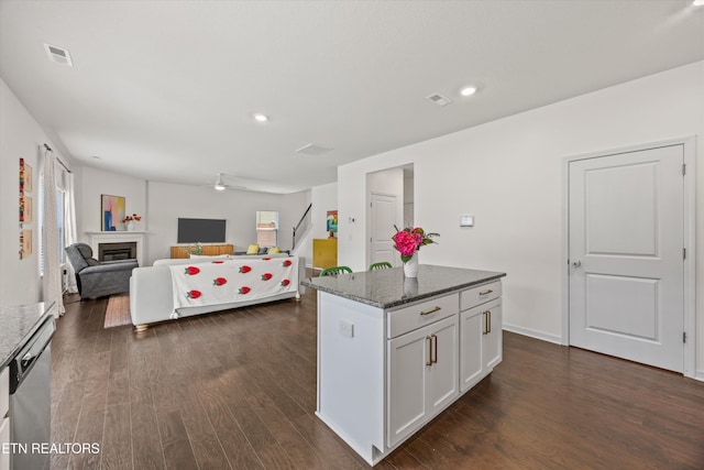 1171 Hampton Place Cir, Loudon, TN 37774 - kitchen featuring dishwasher, dark wood-style floors, dark stone counters, plenty of natural light, and recessed lighting