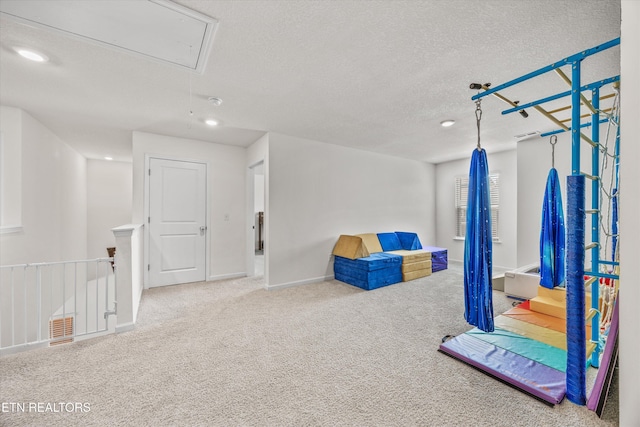 1171 Hampton Place Cir, Loudon, TN 37774 - game room featuring attic access, carpet, a textured ceiling, and recessed lighting