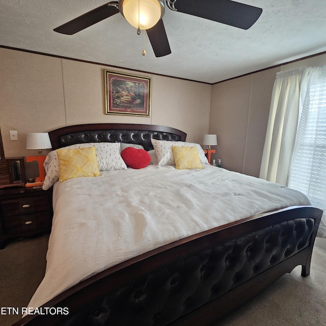 1911 Branam Hill Rd, Jellico, TN 37762 - bedroom with a decorative wall, carpet floors, a textured ceiling, ceiling fan, and crown molding