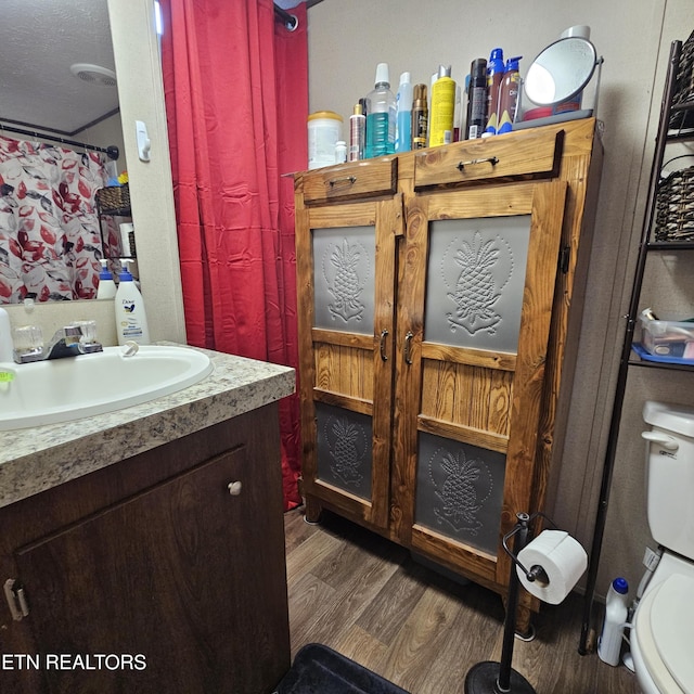 1911 Branam Hill Rd, Jellico, TN 37762 - bathroom featuring wood finished floors and vanity