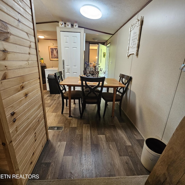 1911 Branam Hill Rd, Jellico, TN 37762 - dining area featuring dark wood finished floors and a textured ceiling
