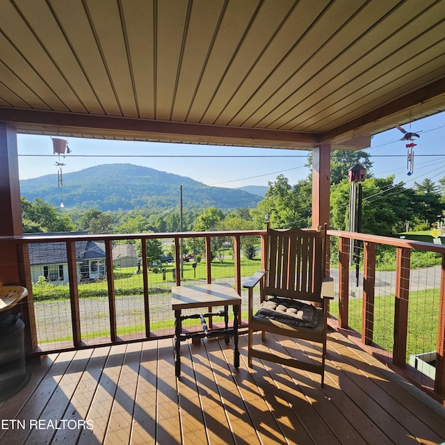 1911 Branam Hill Rd, Jellico, TN 37762 - deck featuring a mountain view and a lawn