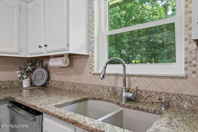 382 Tionesta Dr, Jacksboro, TN 37757 - kitchen featuring dishwasher, white cabinetry, backsplash, and light stone counters