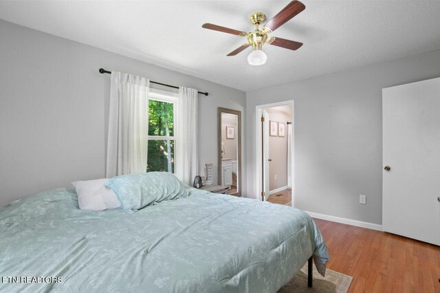 382 Tionesta Dr, Jacksboro, TN 37757 - bedroom with wood finished floors and a ceiling fan