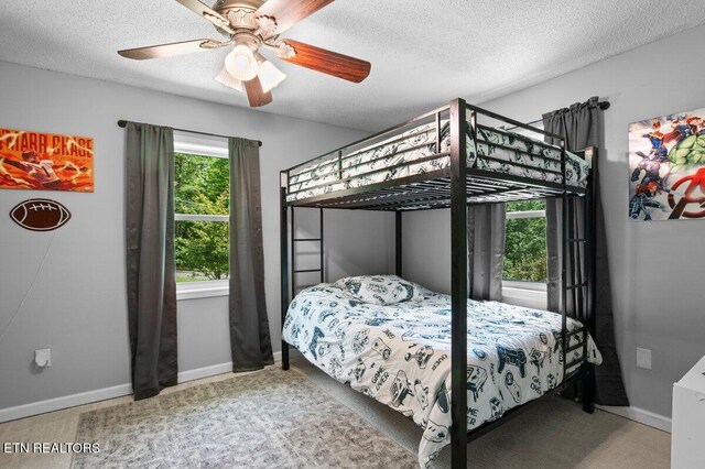 382 Tionesta Dr, Jacksboro, TN 37757 - bedroom featuring a ceiling fan and a textured ceiling