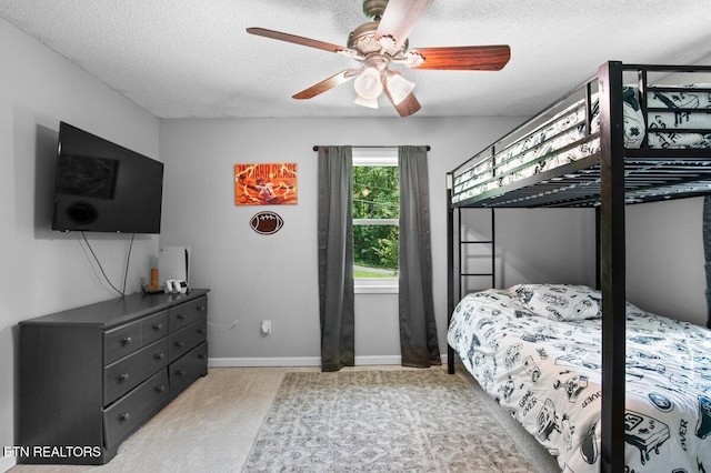382 Tionesta Dr, Jacksboro, TN 37757 - bedroom with carpet floors, a textured ceiling, and a ceiling fan