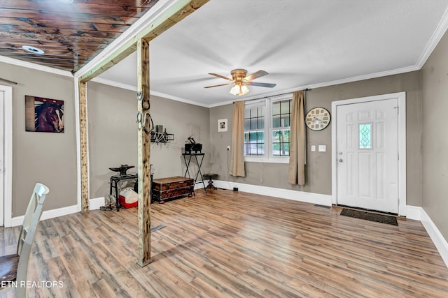 163 Ridge Rd, Sharps Chapel, TN 37866 - entrance foyer with a ceiling fan, wood finished floors, and ornamental molding