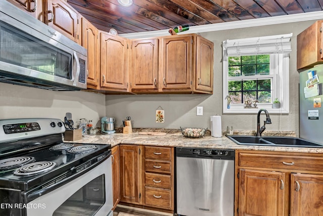 163 Ridge Rd, Sharps Chapel, TN 37866 - kitchen with stainless steel appliances, brown cabinetry, light stone countertops, wood ceiling, and ornamental molding